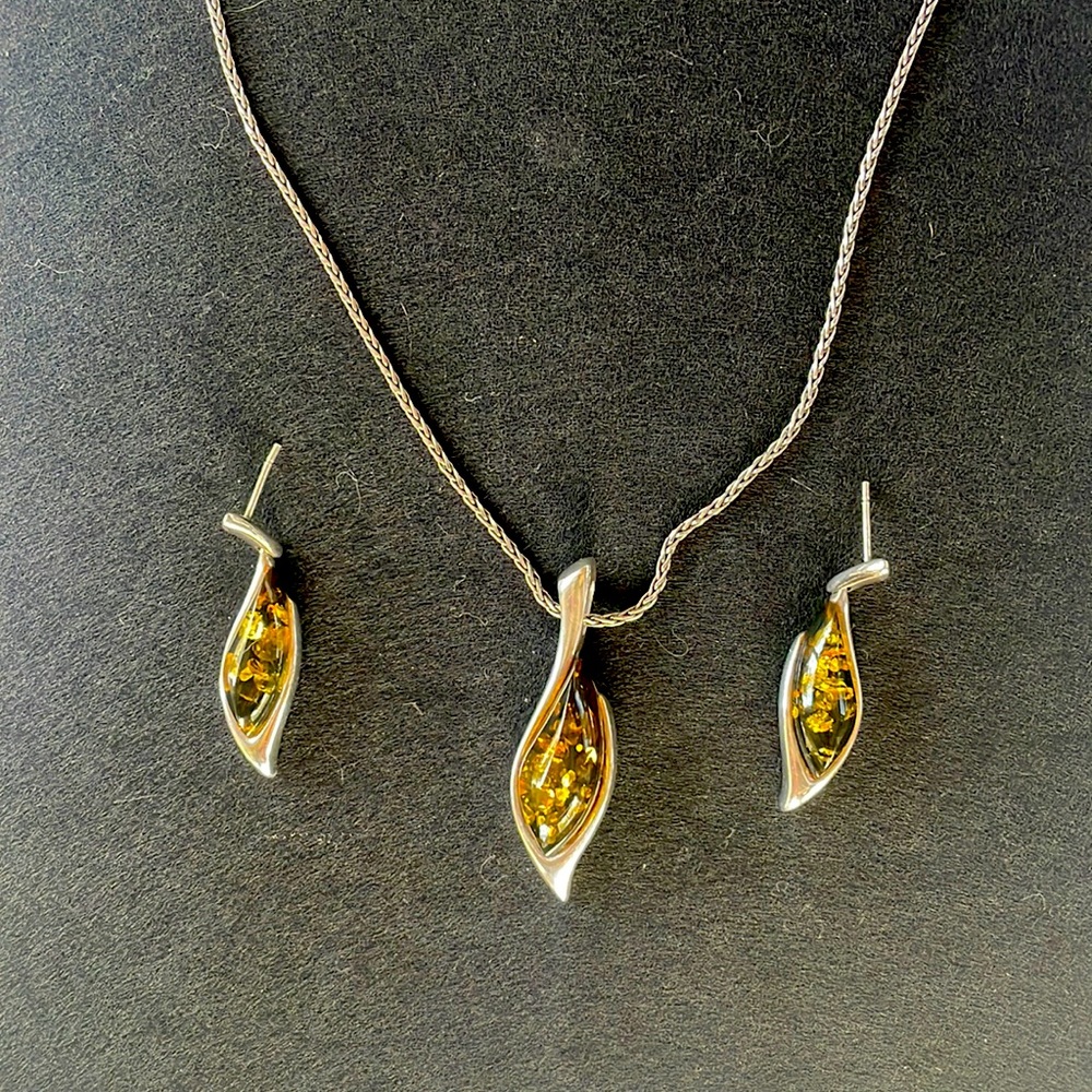 Sterling silver green amber pendant and earrings.